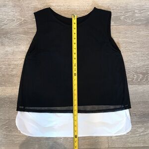 Black Lined Sleeveless Blouse with White Hem